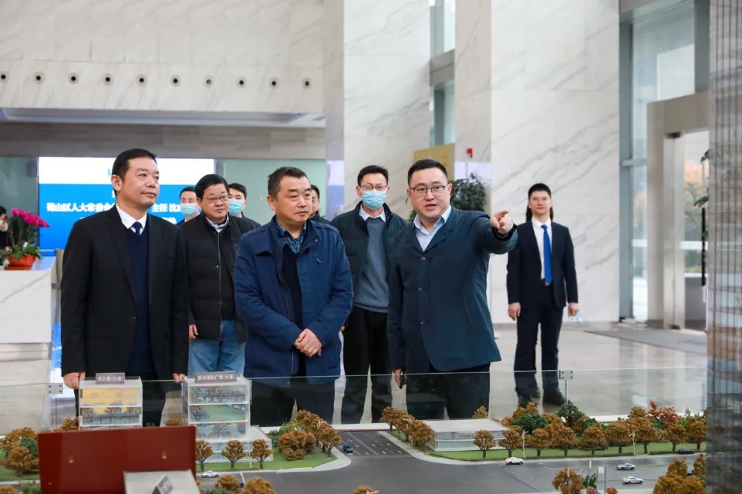 合肥市蜀山區人大常委會主任沈成富一行深入新華控股集團和華地集團調研指導！